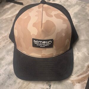 Melin Tan and Black Cap